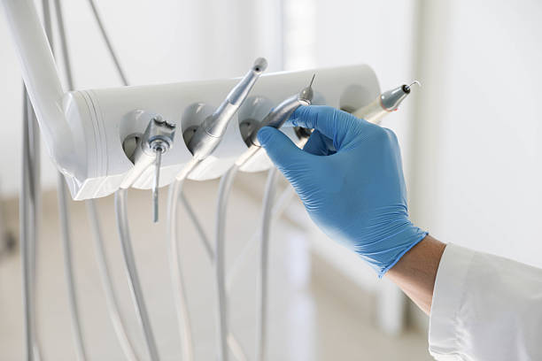 Professional Emergency Dentist technician working in Collins, MS